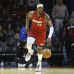 Nov 26, 2025; Miami, Florida, USA; Miami Heat center Bam Adebayo (13) brings the ball up court against the Milwaukee Bucks during the second half of an NBA Cup game at Kaseya Center. Mandatory Credit: Rhona Wise-Imagn Images