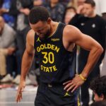 Nov 26, 2025; San Francisco, California, USA; Golden State Warriors guard Stephen Curry (30) gets up injured after a play against the Houston Rockets in the fourth quarter at Chase Center. Mandatory Credit: David Gonzales-Imagn Images