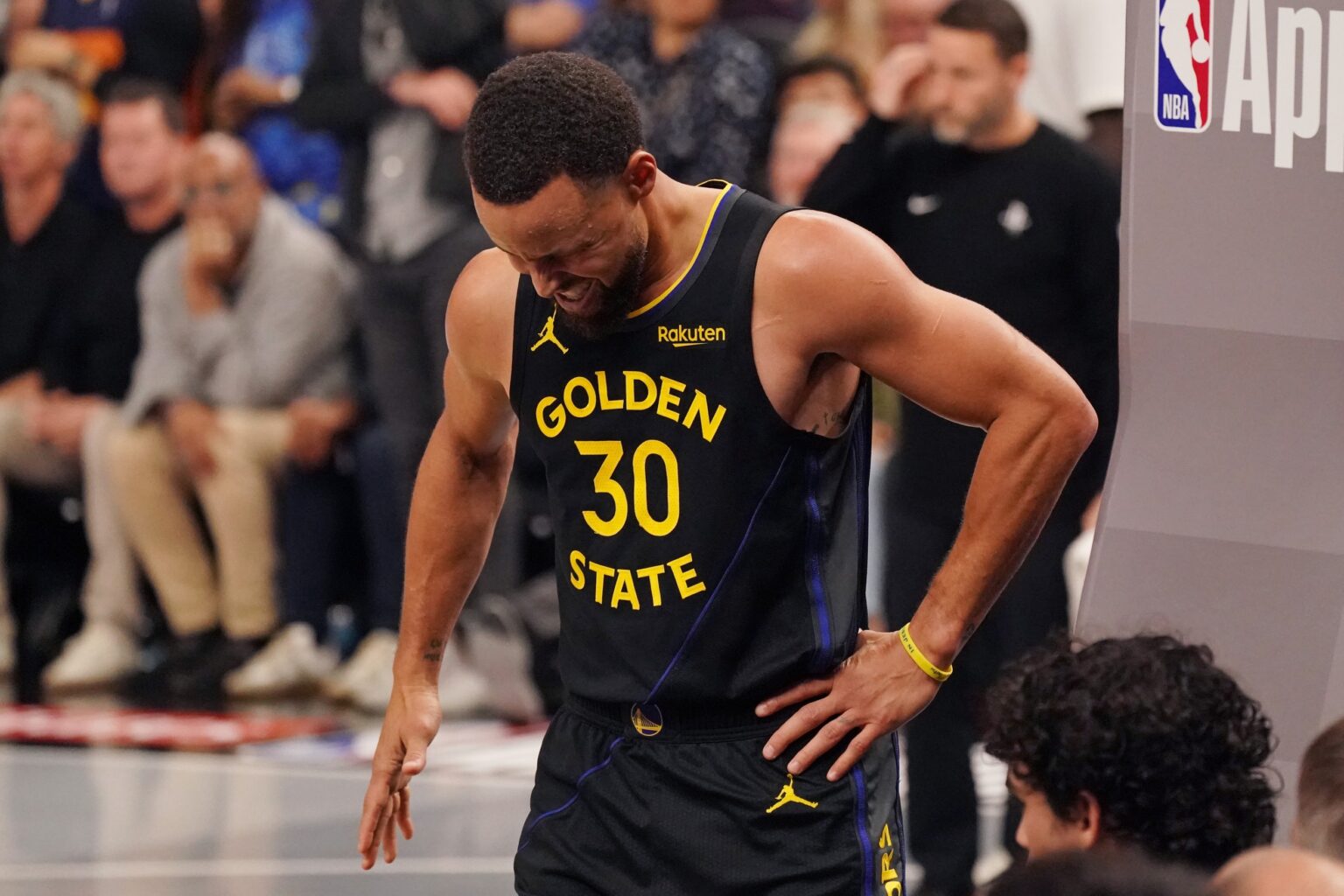 Nov 26, 2025; San Francisco, California, USA; Golden State Warriors guard Stephen Curry (30) gets up injured after a play against the Houston Rockets in the fourth quarter at Chase Center. Mandatory Credit: David Gonzales-Imagn Images