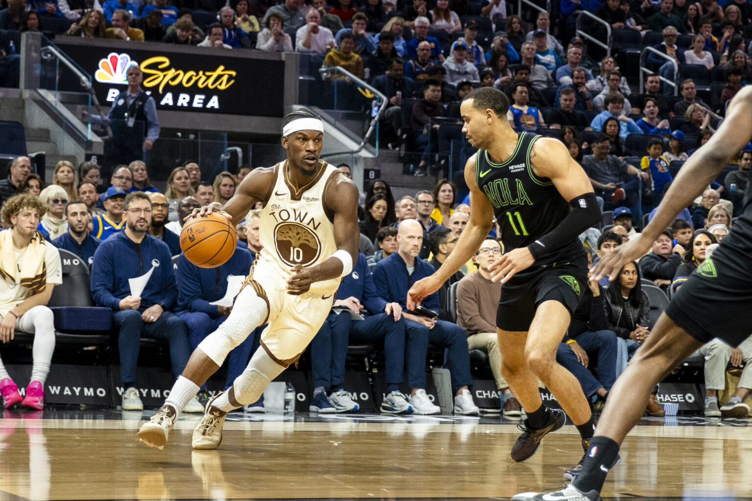 Nov 29, 2025; San Francisco, California, USA; Golden State Warriors forward Jimmy Butler III (10) drives past New Orleans Pelicans guard Bryce McGowens (11) during the fourth quarter at Chase Center. Mandatory Credit: John Hefti-Imagn Images