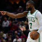 Nov 30, 2025; Cleveland, Ohio, USA; Boston Celtics guard Jaylen Brown (7) reacts after a defensive play during the second half against the Cleveland Cavaliers at Rocket Arena. Mandatory Credit: David Dermer-Imagn Images