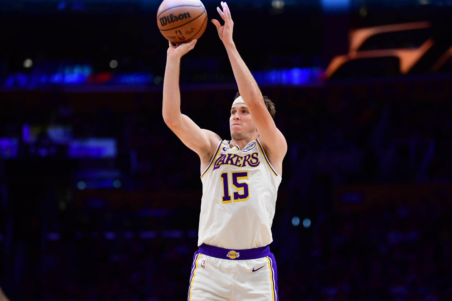 Nov 30, 2025; Los Angeles, California, USA; Los Angeles Lakers guard Austin Reaves (15) shoots against the New Orleans Pelicans during the first half at Crypto.com Arena. Mandatory Credit: Gary A. Vasquez-Imagn Images