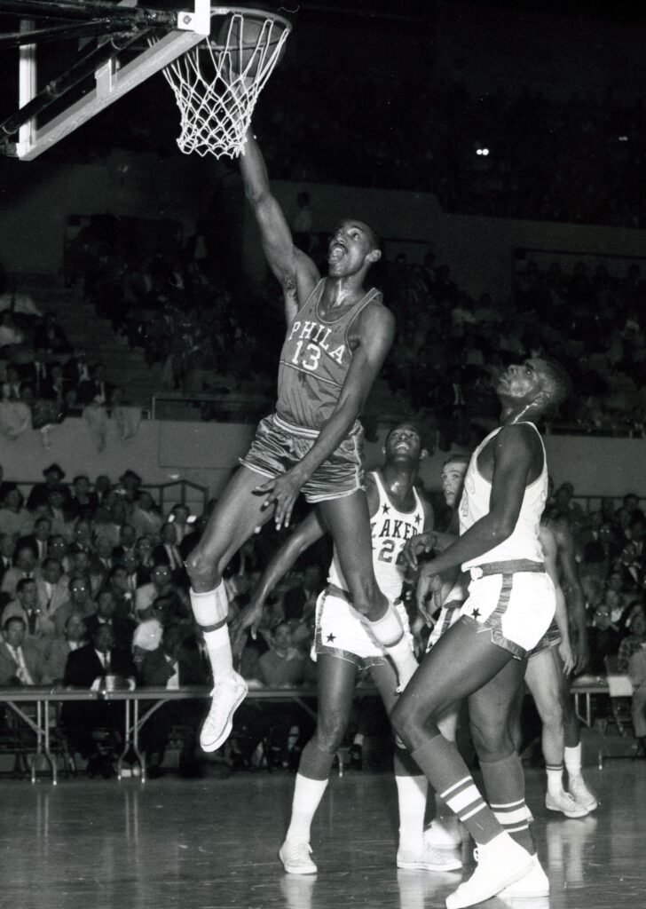 Unknown date; Los Angeles, CA, USA; FILE PHOTO; Philadelphia Warriors center Wilt Chamberlain (13) dunks the ball against the Los Angeles Lakers at the Los Angeles Sports Arena. Mandatory Credit: Darryl Norenberg-Imagn Images