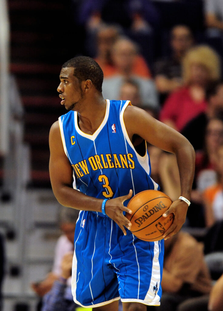 Nov. 11, 2009; Phoenix, AZ, USA; New Orleans Hornets guard Chris Paul against the Phoenix Suns at the US Airways Center. Mandatory Credit: Mark J. Rebilas-Imagn Images