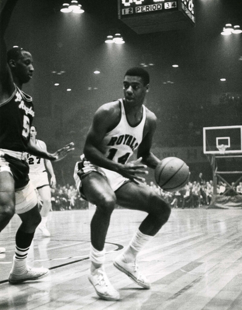 Unknown date; Cincinnati, OH, USA; Cincinnati Royals guard Oscar Robertson (14) in action against Los Angeles Lakers guard Dick Barnett (5). Robertson, a 12-time NBA All Star, scored 26,710 points in 1,040 games and is the only player ever to average a triple double for a season in 1962 with 30.8 points per game, 12.5 rebounds per game and 11.4 assists per game. Mandatory Credit: Malcolm Emmons-Imagn Images
