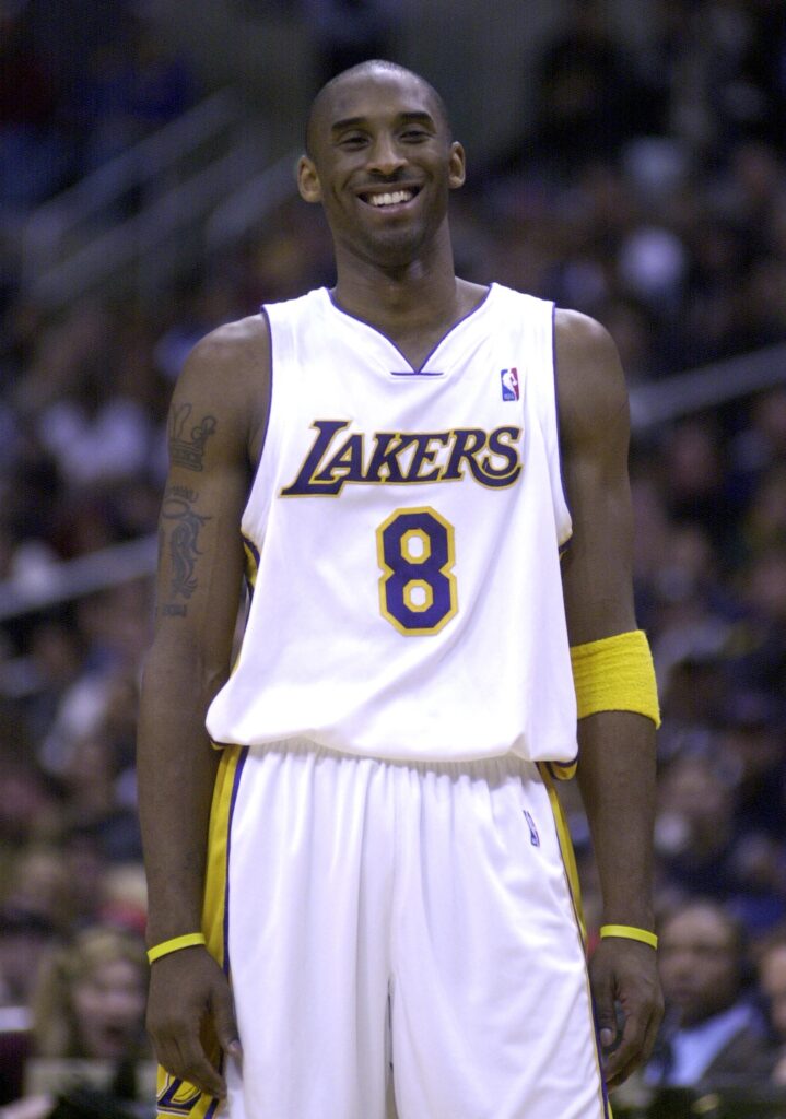 Dec 25, 2003; Los Angeles, CA, USA; Los Angeles Lakers guard Kobe Bryant (8) during the game against the Houston Rockets at the Staples Center. Mandatory Credit: Kirby Lee/Image of Sport-Imagn Images