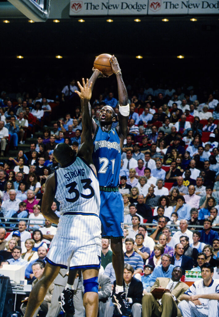 Unknown date; Orlando, FL; USA; FILE PHOTO; Minnesota Timberwolves forward Kevin Garnett (21) attempts a shot against Orlando Magic forward Derek Strong (33) at the Orlando Arena. Mandatory Credit: RVR Photos-Imagn Images