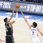 Oct 30, 2024; Oklahoma City, Oklahoma, USA; San Antonio Spurs center Victor Wembanyama (1) shoots as Oklahoma City Thunder forward Chet Holmgren (7) defends during the first quarter at Paycom Center. Mandatory Credit: Alonzo Adams-Imagn Images