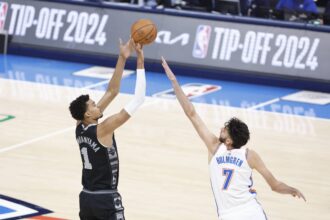Oct 30, 2024; Oklahoma City, Oklahoma, USA; San Antonio Spurs center Victor Wembanyama (1) shoots as Oklahoma City Thunder forward Chet Holmgren (7) defends during the first quarter at Paycom Center. Mandatory Credit: Alonzo Adams-Imagn Images