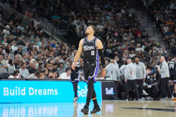 Nov 16, 2025; San Antonio, Texas, USA; Sacramento Kings guard Zach LaVine (8) walks up the court in the first half against the San Antonio Spurs at Frost Bank Center. Mandatory Credit: Daniel Dunn-Imagn Images