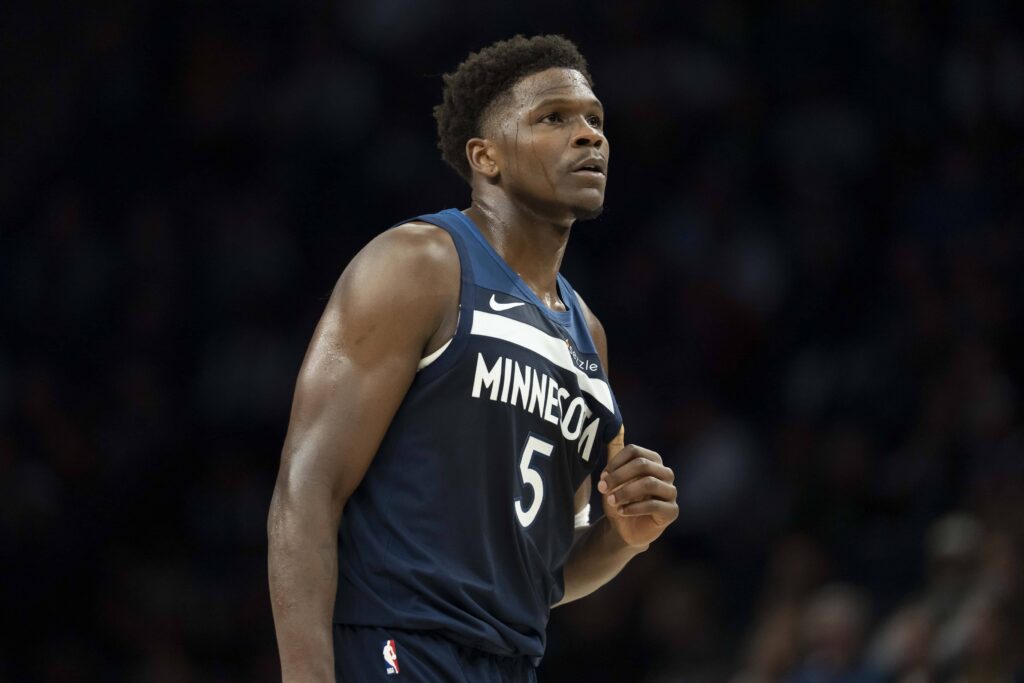 Minneapolis, Minnesota, USA; Minnesota Timberwolves guard Anthony Edwards (5) looks on against the Washington Wizards in the first half at Target Center. Mandatory Credit: Jesse Johnson-Imagn Images