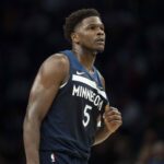 Minneapolis, Minnesota, USA; Minnesota Timberwolves guard Anthony Edwards (5) looks on against the Washington Wizards in the first half at Target Center. Mandatory Credit: Jesse Johnson-Imagn Images