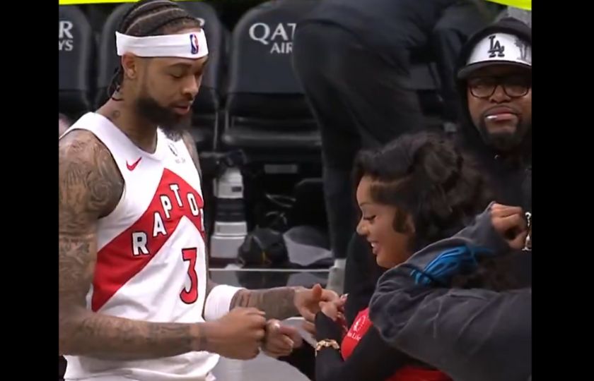 Brandon Ingram and GloRilla perform their special handshake after the Raptors game. Mandatory Credit: X user: @Bleacher Report.