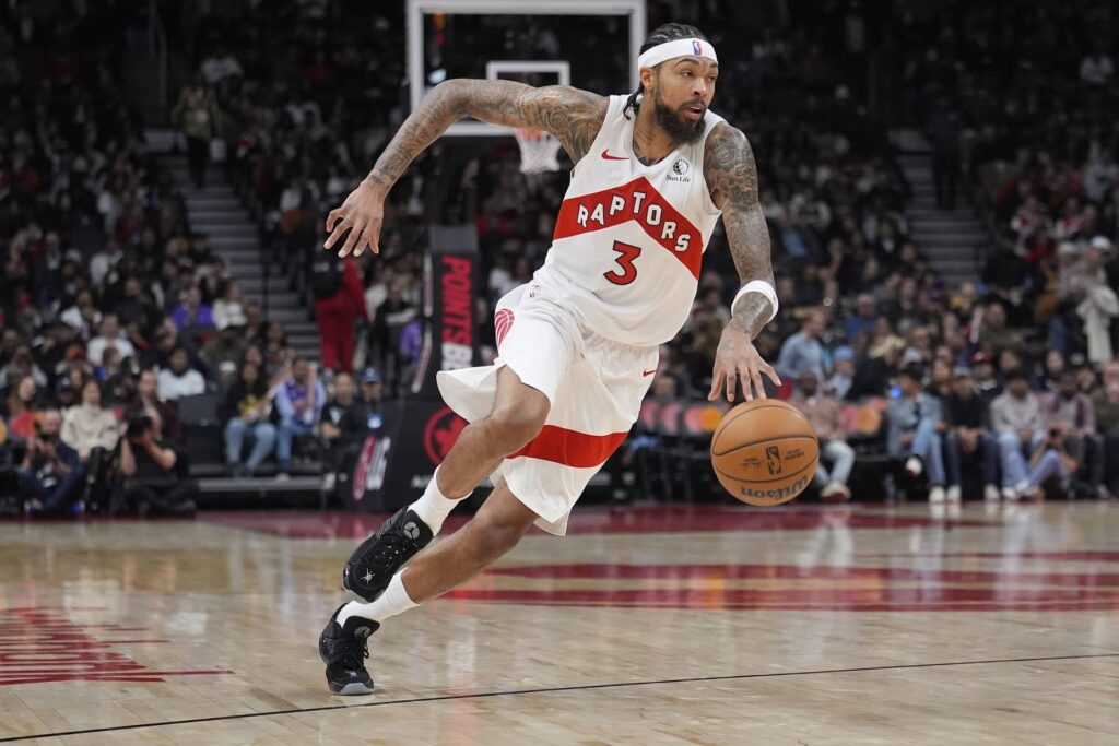 Toronto, Ontario, CAN; Toronto Raptors forward Brandon Ingram (3) dribbles the ball against the Milwaukee Bucks during the second half at Scotiabank Arena. Mandatory Credit: John E. Sokolowski-Imagn Images