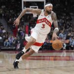 Toronto, Ontario, CAN; Toronto Raptors forward Brandon Ingram (3) dribbles the ball against the Milwaukee Bucks during the second half at Scotiabank Arena. Mandatory Credit: John E. Sokolowski-Imagn Images