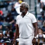 Dallas, Texas, USA; Killer 3 head coach Charles Oakley watches a game against Power during week four of the Big3 3-on-3 basketball league at American Airlines Center. Mandatory Credit: Aric Becker-Imagn Images