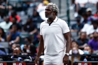 Dallas, Texas, USA; Killer 3 head coach Charles Oakley watches a game against Power during week four of the Big3 3-on-3 basketball league at American Airlines Center. Mandatory Credit: Aric Becker-Imagn Images