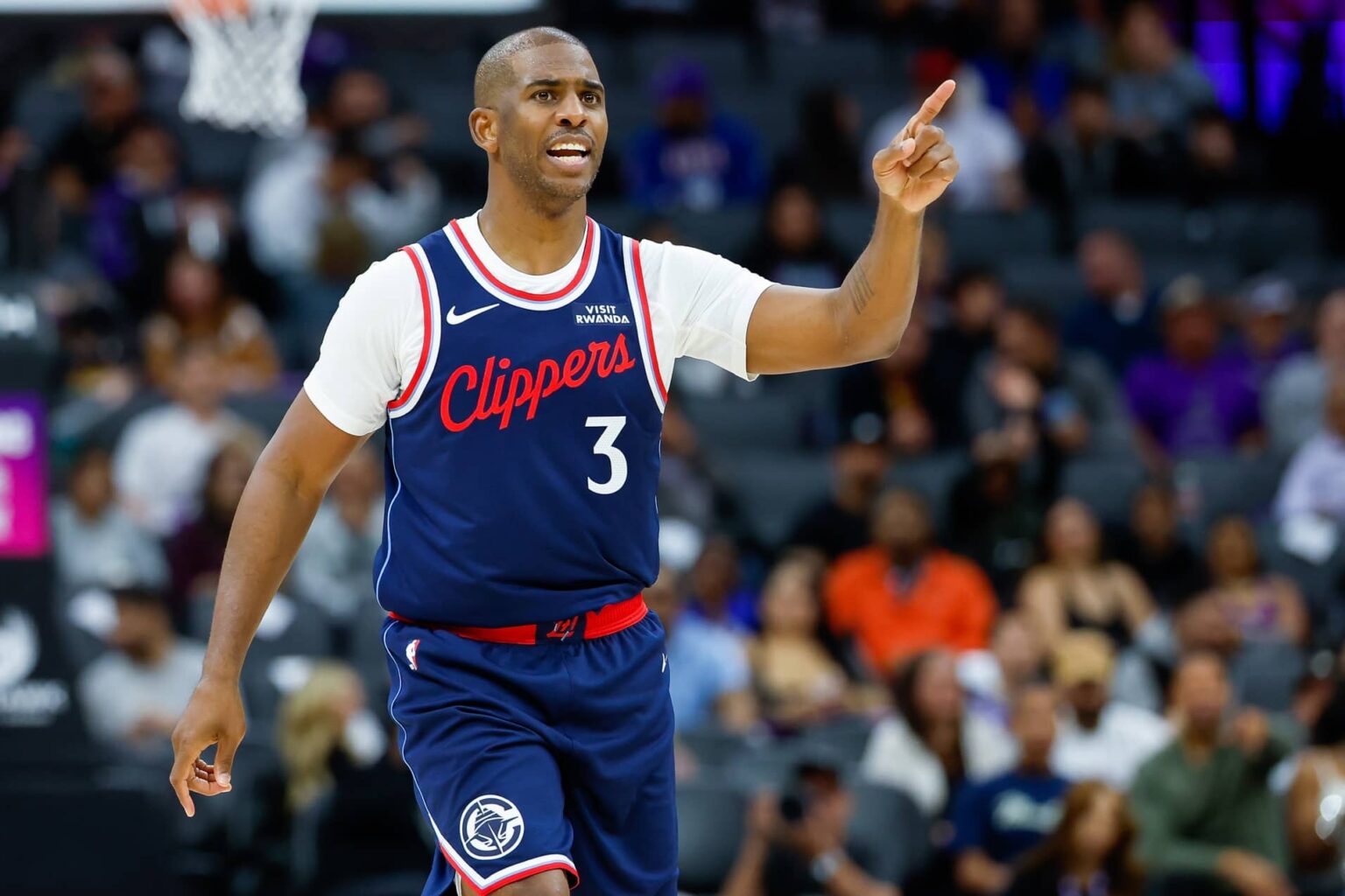 Sacramento, California, USA; Los Angeles Clippers guard Chris Paul (3) gestures towards a teammate during the third quarter against the Sacramento Kings at Golden 1 Center. Mandatory Credit: Sergio Estrada-Imagn Images