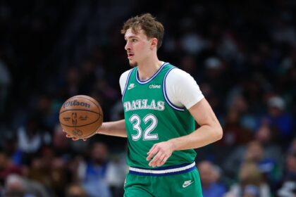 Dallas, Texas, USA; Dallas Mavericks forward Cooper Flagg (32) dribbles during the third quarter against the Milwaukee Bucks at American Airlines Center. Mandatory Credit: Kevin Jairaj-Imagn Images