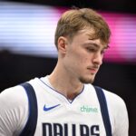 Dallas, Texas, USA; Dallas Mavericks forward Cooper Flagg (32) looks on during the first quarter against the Indiana Pacers at the American Airlines Center. Mandatory Credit: Jerome Miron-Imagn Images