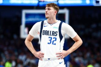 Dallas, Texas, USA; Dallas Mavericks forward Cooper Flagg (32) reacts against the San Antonio Spurs during the second half at American Airlines Center. Mandatory Credit: Kevin Jairaj-Imagn Images