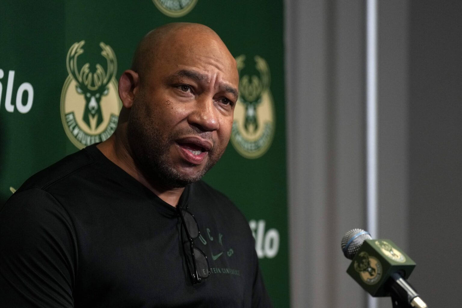Sacramento, California, USA; Milwaukee Bucks assistant coach Darvin Ham talks to media members before the game against the Sacramento Kings at Golden 1 Center. Mandatory Credit: Darren Yamashita-Imagn Images