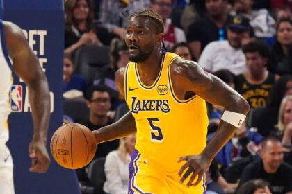 San Francisco, California, USA; Los Angeles Lakers center Deandre Ayton (5) dribbles upcourt against the Golden State Warriors in the second quarter at Chase Center. Mandatory Credit: David Gonzales-Imagn Images