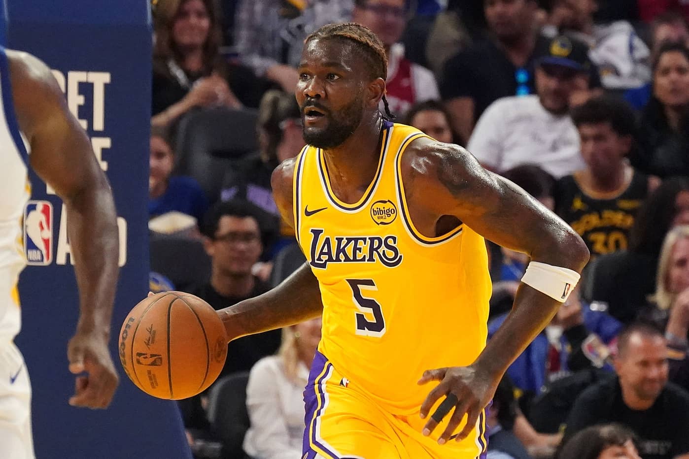 San Francisco, California, USA; Los Angeles Lakers center Deandre Ayton (5) dribbles upcourt against the Golden State Warriors in the second quarter at Chase Center. Mandatory Credit: David Gonzales-Imagn Images