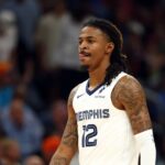 Phoenix, Arizona, USA; Memphis Grizzlies guard Ja Morant (12) against the Phoenix Suns at the Mortgage Matchup Center. Mandatory Credit: Mark J. Rebilas-Imagn Images