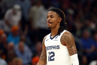 Phoenix, Arizona, USA; Memphis Grizzlies guard Ja Morant (12) against the Phoenix Suns at the Mortgage Matchup Center. Mandatory Credit: Mark J. Rebilas-Imagn Images