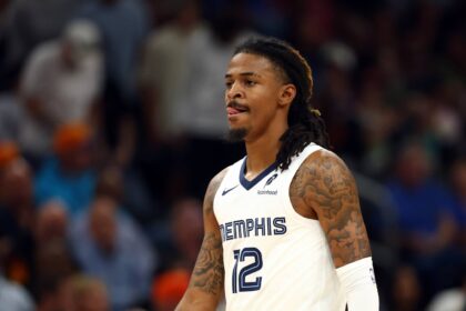 Phoenix, Arizona, USA; Memphis Grizzlies guard Ja Morant (12) against the Phoenix Suns at the Mortgage Matchup Center. Mandatory Credit: Mark J. Rebilas-Imagn Images