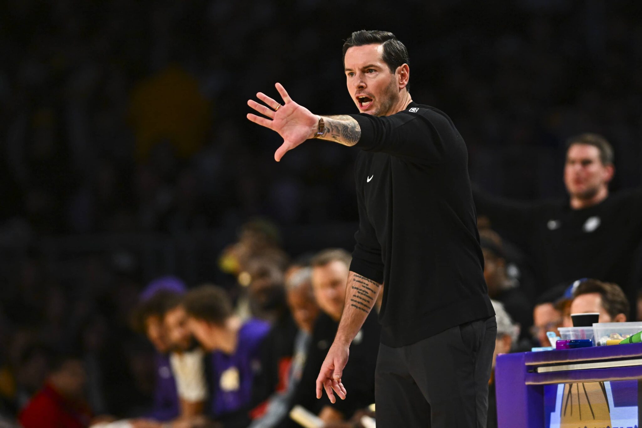 Los Angeles, California, USA; Los Angeles Lakers Head Coach JJ Redick reacts during the game against the Miami Heat during the first half at Crypto.com Arena. Mandatory Credit: Jonathan Hui-Imagn Images