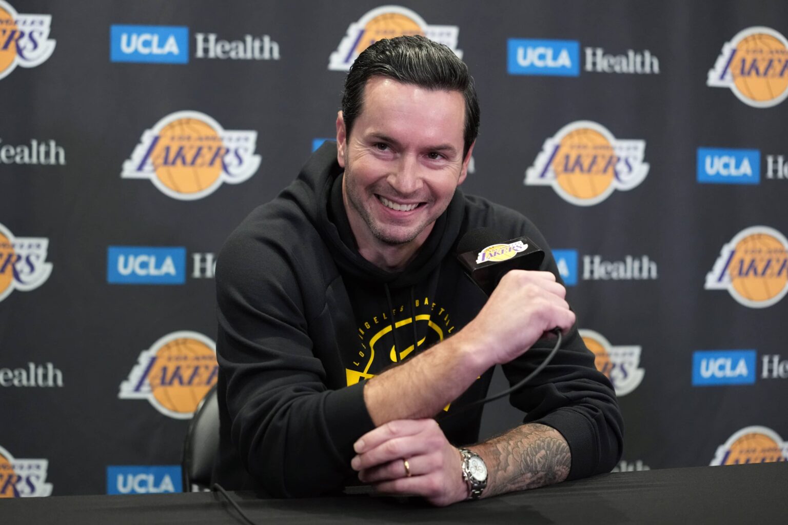 Los Angeles, California, USA; Los Angeles Lakers head coach JJ Redick at press conference at Crypto.com Arena. Mandatory Credit: Kirby Lee-Imagn Images