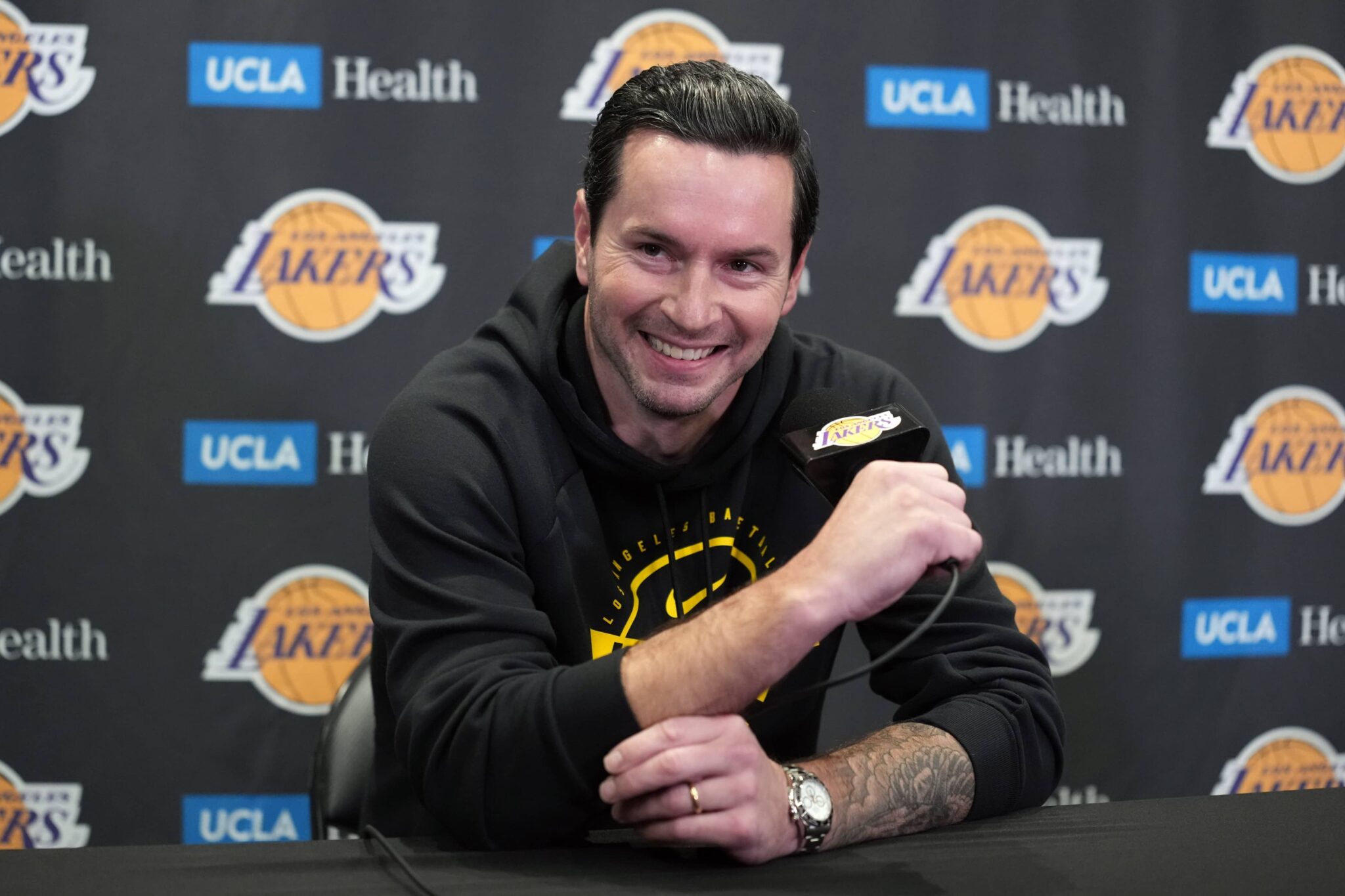 Los Angeles, California, USA; Los Angeles Lakers head coach JJ Redick at press conference at Crypto.com Arena. Mandatory Credit: Kirby Lee-Imagn Images