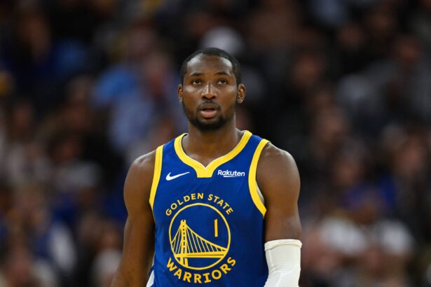 San Francisco, California, USA; Golden State Warriors forward Jonathan Kuminga (1) looks on against the Phoenix Suns in the third quarter at Chase Center. Mandatory Credit: Eakin Howard-Imagn Images