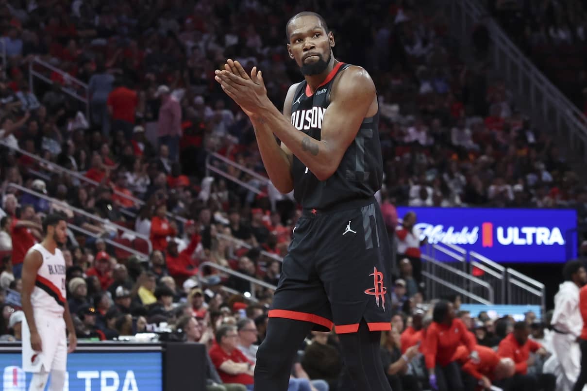 Houston, Texas, USA; Houston Rockets forward Kevin Durant (7) claps after a play during the fourth quarter against the Portland Trail Blazers at Toyota Center. Mandatory Credit: Troy Taormina-Imagn Images
