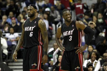 Washington, DC, USA; Miami Heat shooting guard Dwyane Wade (3) smiles while standing on the court with Heat small forward LeBron James (6) against the Washington Wizards in the second half at the Verizon Center. Mandatory Credit: Geoff Burke-Imagn Images