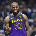 Dallas, Texas, USA; Los Angeles Lakers forward LeBron James (23) laughs during the first half against the Dallas Mavericks at American Airlines Center. Mandatory Credit: Kevin Jairaj-Imagn Images