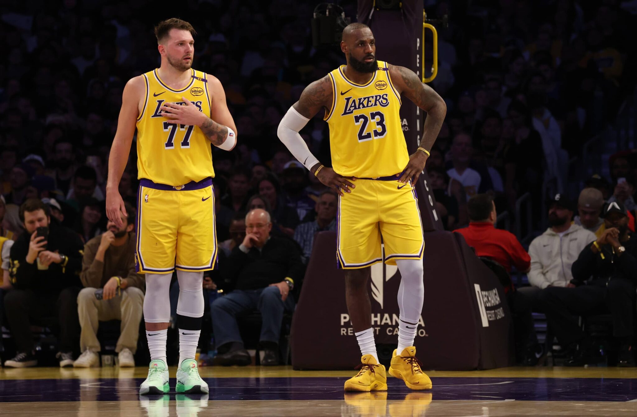 Los Angeles, California, USA; Los Angeles Lakers guard Luka Doncic (77) and forward LeBron James (23) during the second quarter against the Minnesota Timberwolves at Crypto.com Arena. Mandatory Credit: Jason Parkhurst-Imagn Images