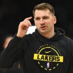 Los Angeles, California, USA; Los Angeles Lakers guard Luka Doncic (77) reacts before the game against the Miami Heat at Crypto.com Arena. Mandatory Credit: Jonathan Hui-Imagn Images