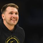 Los Angeles, California, USA; Los Angeles Lakers guard Luka Doncic (77) reacts before the game against the Miami Heat at Crypto.com Arena. Mandatory Credit: Jonathan Hui-Imagn Images