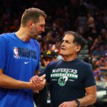 Phoenix, Arizona, USA; Dallas Mavericks owner Mark Cuban (right) with former player Dirk Nowitzki against the Phoenix Suns in Game 7 of the second round of the 2022 NBA Playoffs at Footprint Center. Mandatory Credit: Mark J. Rebilas-Imagn Images