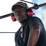 Homestead, Florida, USA; 23XI Team co-owner Michael Jordan sits atop of the pitbox during the 4EVER 400 presented by Mobil 1 at Homestead-Miami Speedway. Mandatory Credit: Jasen Vinlove-Imagn Images