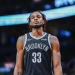 Toronto, Ontario, CAN; Brooklyn Nets center Nic Claxton (33) looks on against the Toronto Raptors during the second half at Scotiabank Arena. Mandatory Credit: Kevin Sousa-Imagn Images