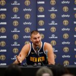 Denver, CO, USA; Denver Nuggets player Nikola Jokic (15) takes questions during media day at Ball Arena. Mandatory Credit: Isaiah J. Downing-Imagn Images