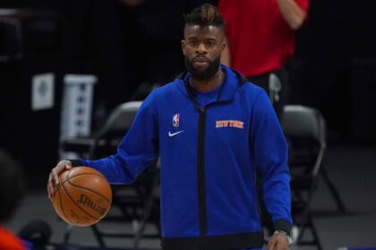 Denver, Colorado, USA; New York Knicks forward Reggie Bullock (25) prior to the game against the Denver Nuggets at Ball Arena. Mandatory Credit: Ron Chenoy-Imagn Images