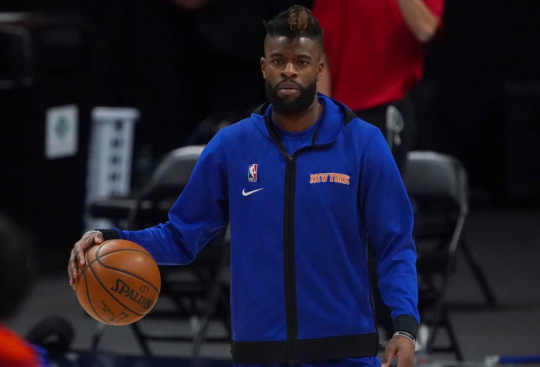 Denver, Colorado, USA; New York Knicks forward Reggie Bullock (25) prior to the game against the Denver Nuggets at Ball Arena. Mandatory Credit: Ron Chenoy-Imagn Images