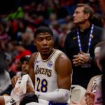 New Orleans, Louisiana, USA; Los Angeles Lakers forward Rui Hachimura (28) sits on the bench against the New Orleans Pelicans during the first half at Smoothie King Center. Mandatory Credit: Stephen Lew-Imagn Images