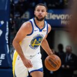 Indianapolis, Indiana, USA; Golden State Warriors guard Stephen Curry (30) dribbles the ball in the first half against the Indiana Pacers at Gainbridge Fieldhouse. Mandatory Credit: Trevor Ruszkowski-Imagn Images