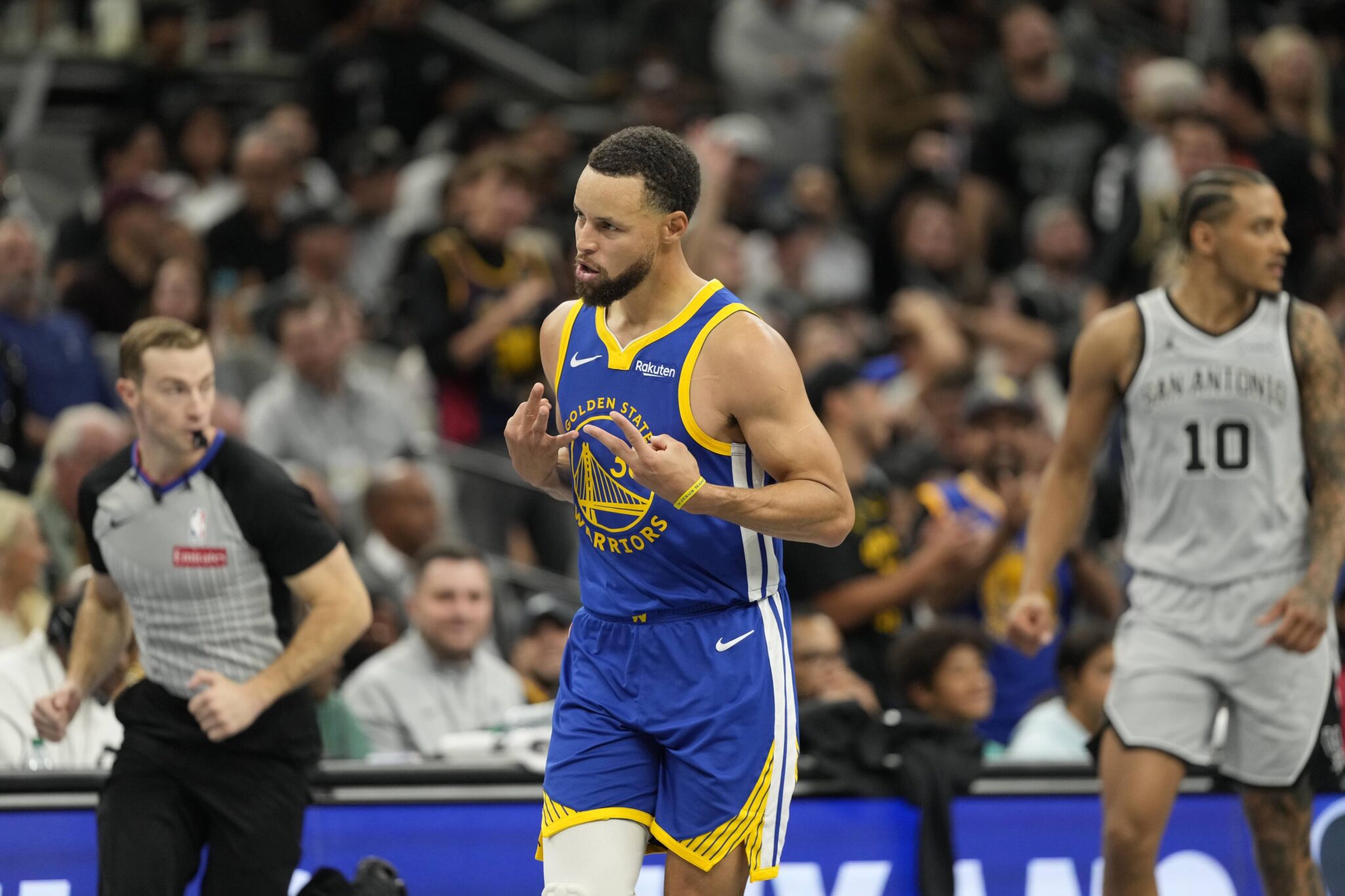 San Antonio, Texas, USA; Golden State Warriors guard Stephen Curry (30) reacts after scoring a three-point basket during the second half against the San Antonio Spurs at Frost Bank Center. Mandatory Credit: Scott Wachter-Imagn